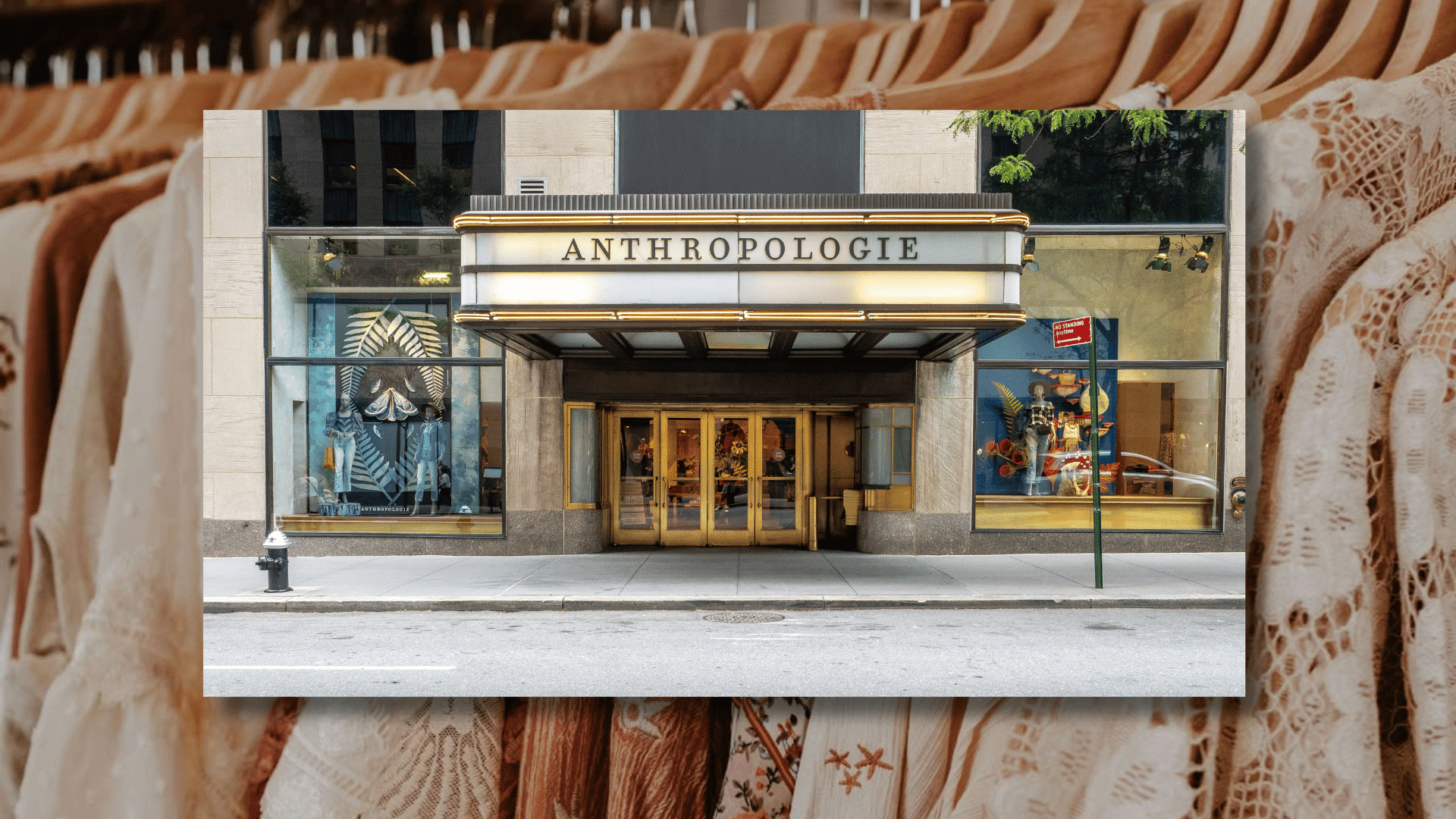 Anthropologie storefront framed by a rack of neutral-toned clothing and lace garments in the foreground