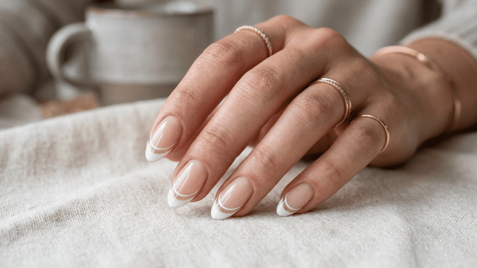 double french tip nails with thin layered line detail