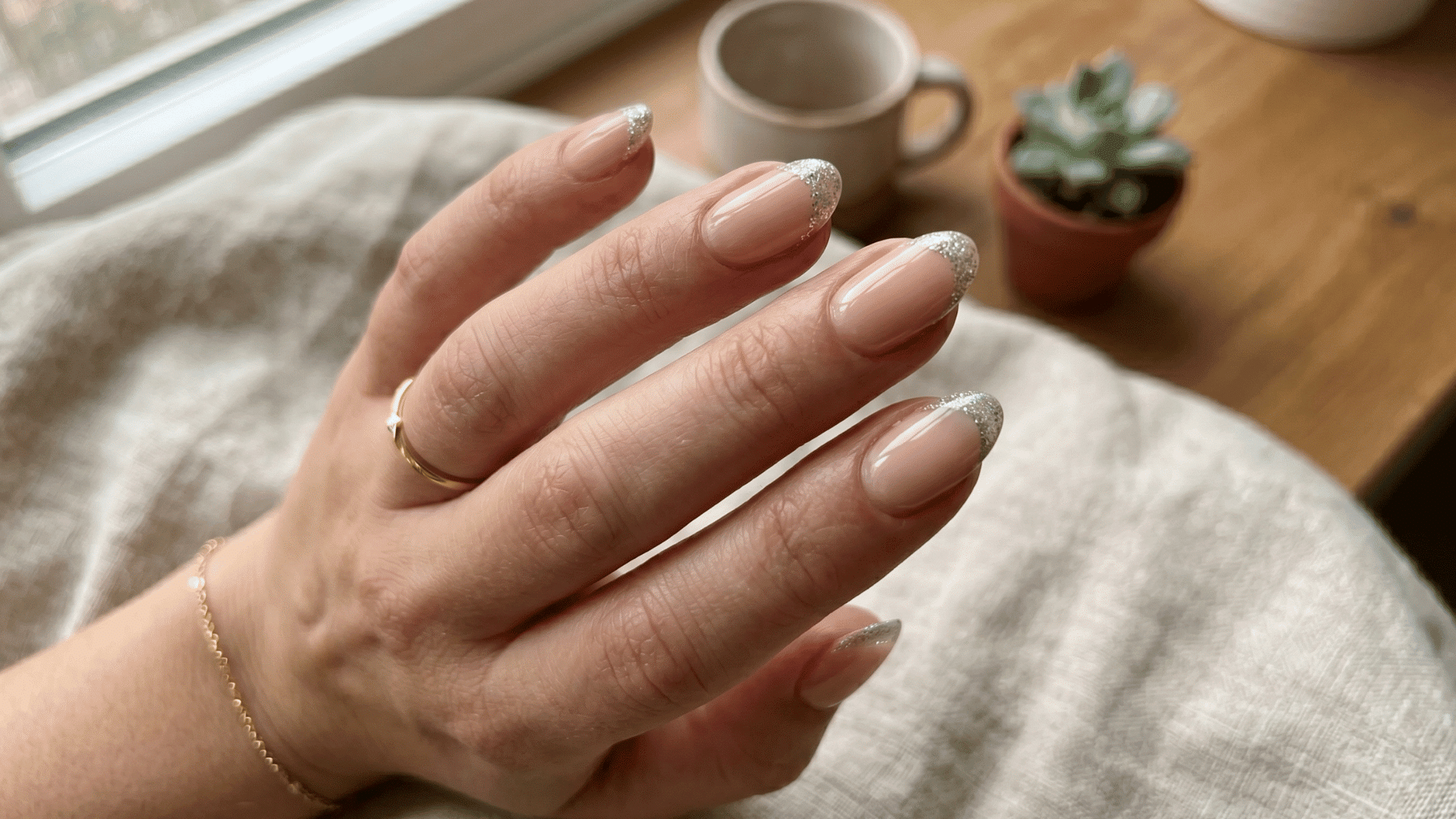 glitter micro french nails with subtle sparkle tips