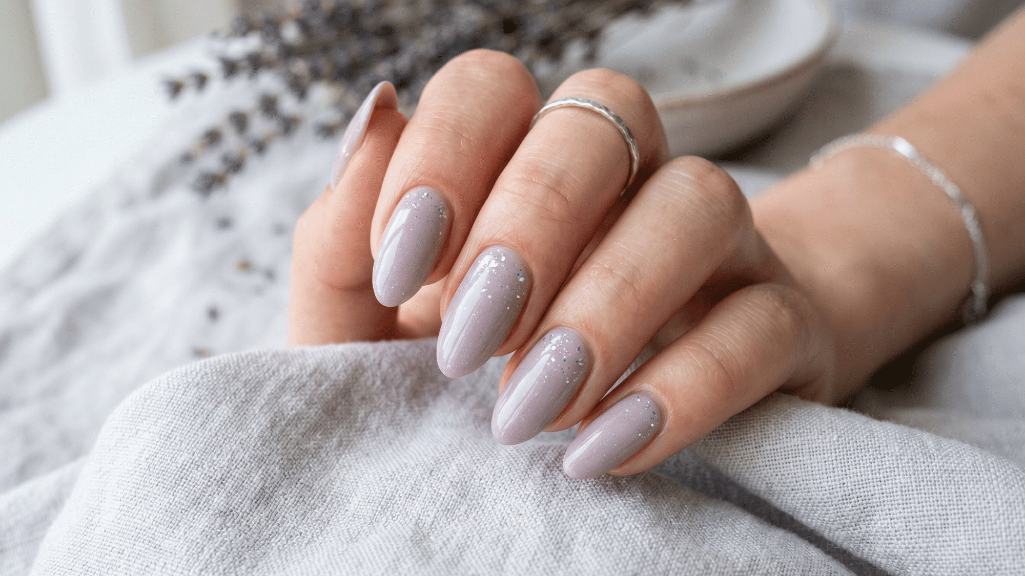 lavender nude nails with subtle cool toned finish