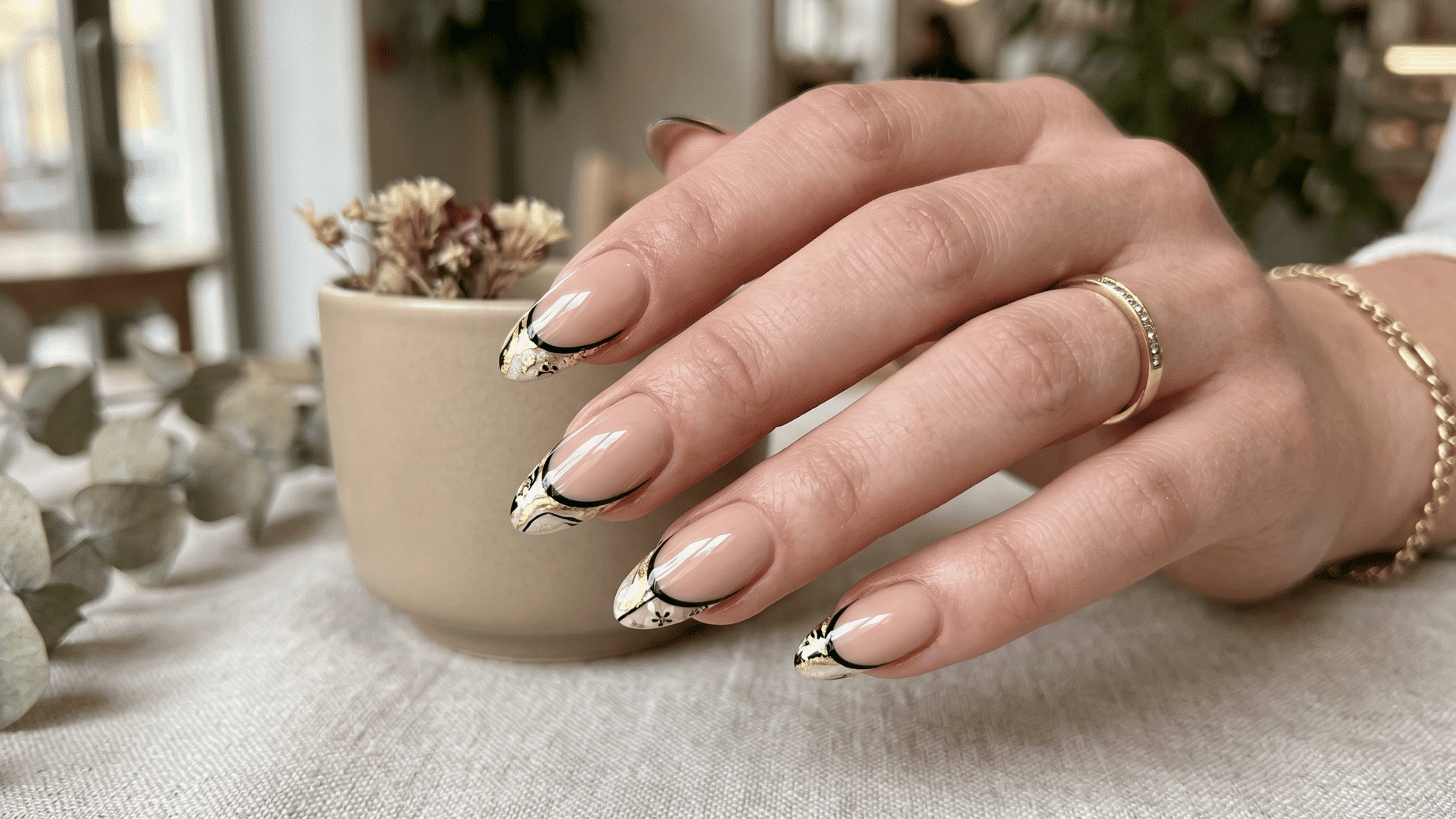 outline french nails with nude base and unique edge design
