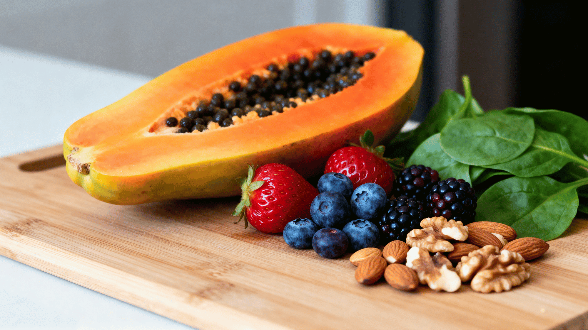 Papaya, berries, nuts, and spinach for weekly skin glow nutrition plan