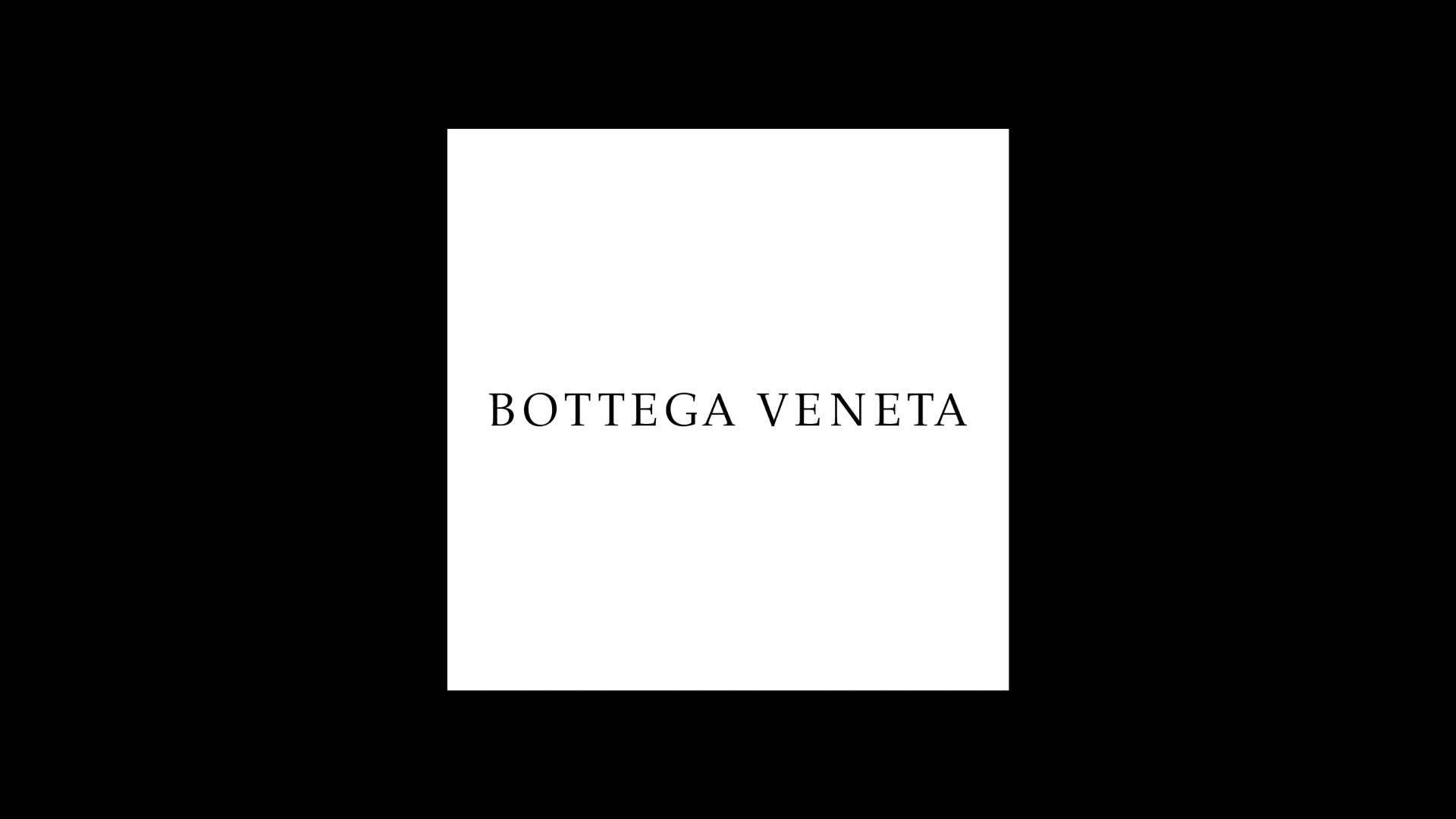 bottega veneta logo with a black backdrop