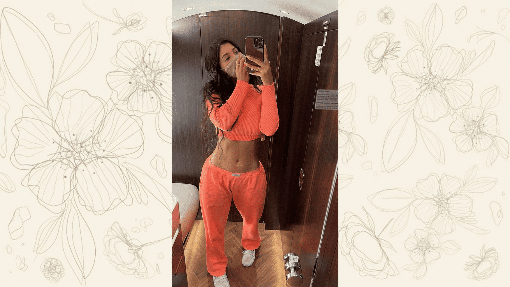 mirror selfie outfit with orange co ord set and gold chain belt styled in casual trendy aesthetic look