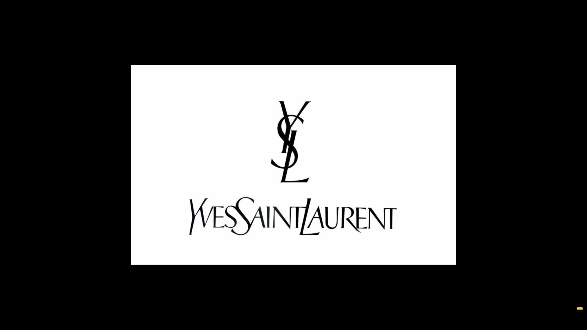saint laurent logo with a black backdrop