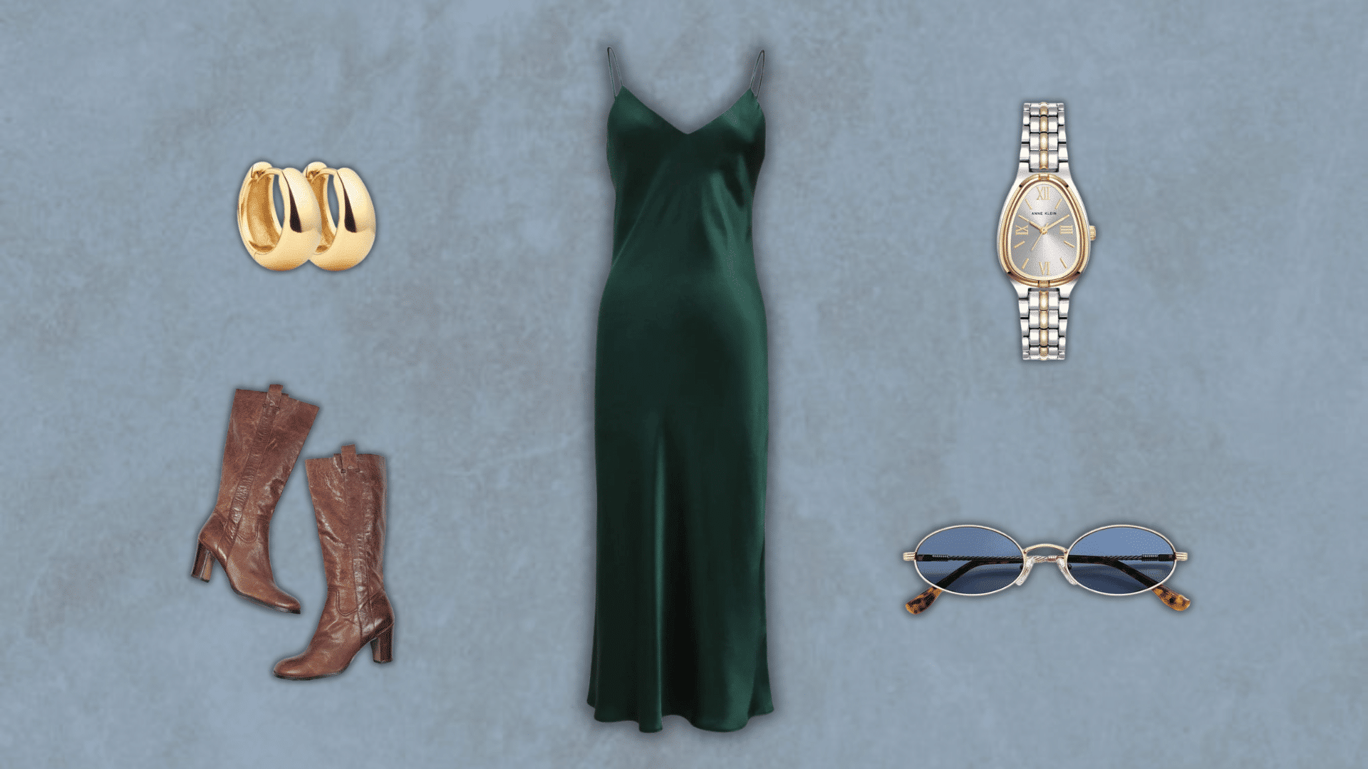 90s style green satin slip dress with brown boots gold earrings and sunglasses flat lay