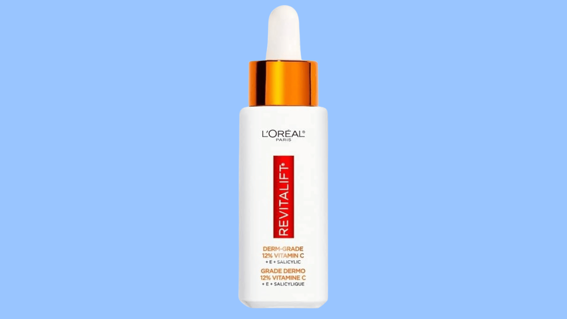 loreal vitamin c serum bottle with vitamin e and salicylic acid on a light blue background