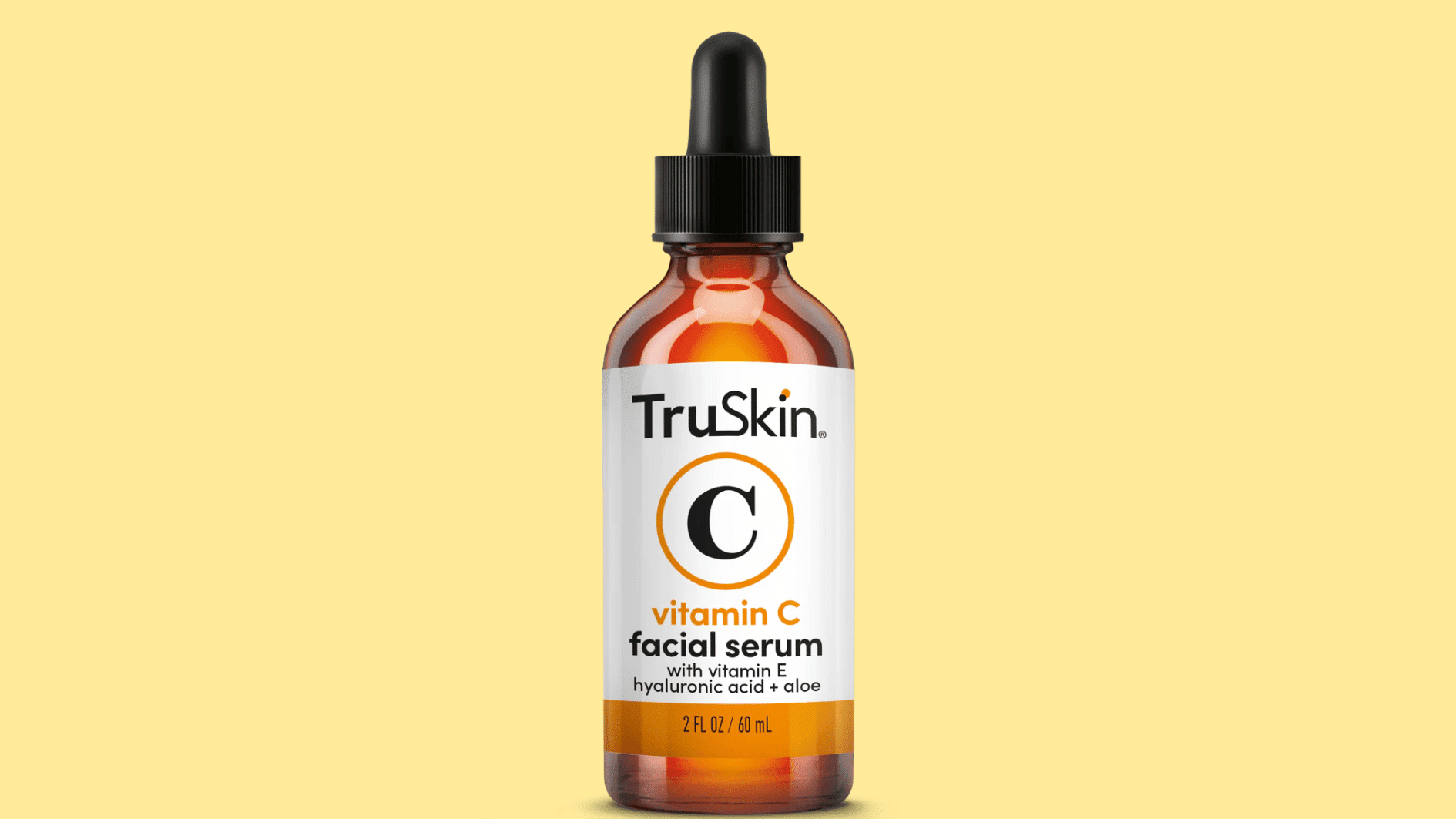 truskin vitamin c facial serum with vitamin c hyaluronic acid and aloe on a pale yellow background