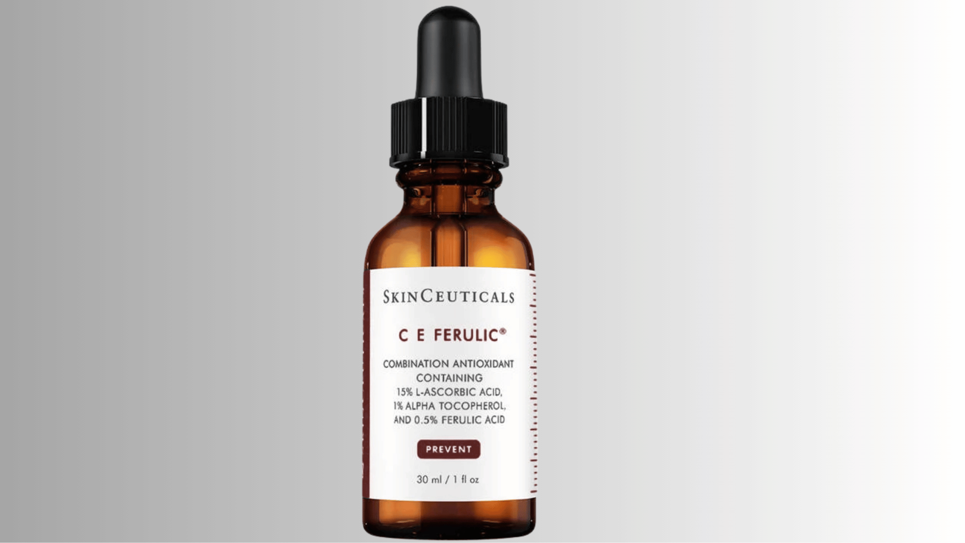 a small bottle of vitamin c serum with dropper